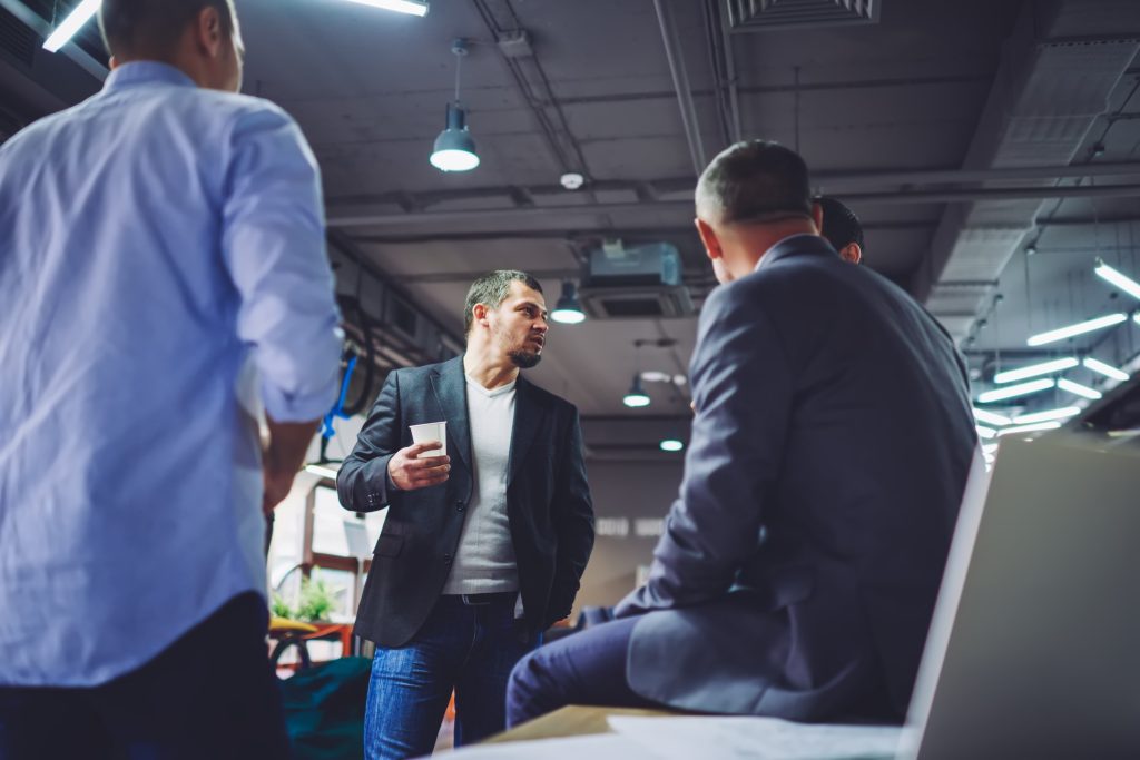 smart casual men talking about trade exchange and financial experience communicate in firm